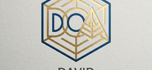 Hexagonal logo with the letters DOA and an abstract design above the name David Owusu-Akyeaw